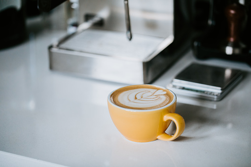 Cafe latte art on kitchen counter