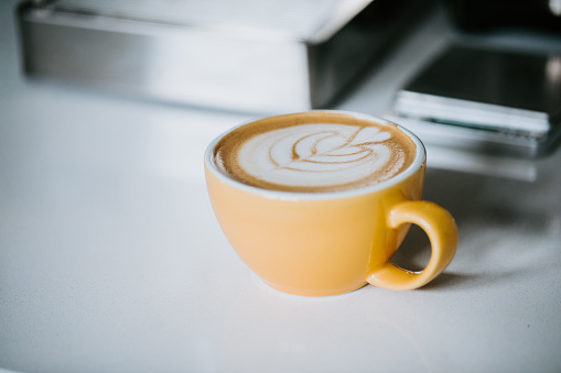 Cafe latte art on kitchen counter
