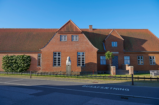 The museum is based on a collection of paintings made by famous Danish painters who lived in Skagen around 1900. The painters have a style similar to the one we find in impressionistic paintings. The style has been developed without influence of impressionistic painters, but later there actually was established a connection between some of the artists and the French impressionists. The museum has been researching in the connection together with Marmottan Musée in Paris and an amazing common exhibition has been held in both countries.
Outside the museum stands a sculpture of architect Thorvald Bindesbøll