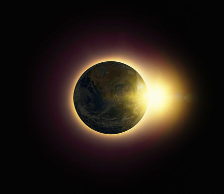 Sun rises behind a back-lit Earth hanging in the vast blackness of space.\n\nPublic domain source image at https://www.nasa.gov/multimedia/imagegallery/image_feature_2159.html