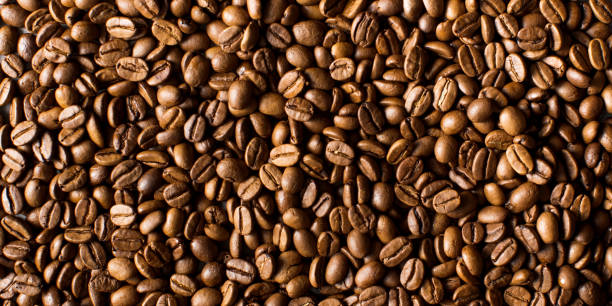 istock Background of roasted coffee beans full frame. A coffee-themed banner. 1405403309