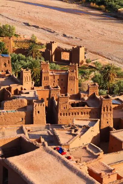 Ait Benhaddou, Morocco. Historic ksar town on a caravan route. UNESCO World Heritage Site. Clay architecture in river valley.