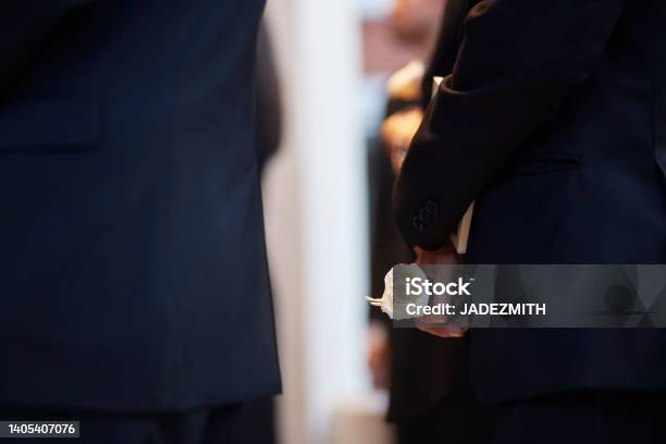 Sandalwood In Hand Artificial Flowers Used During A Funeral Ceremony Stock Photo - Download Image Now