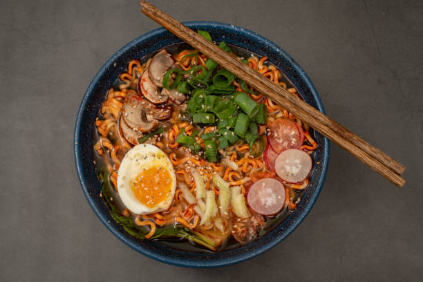istock Ramen noodle in broth with egg and vegetables 1405407639
