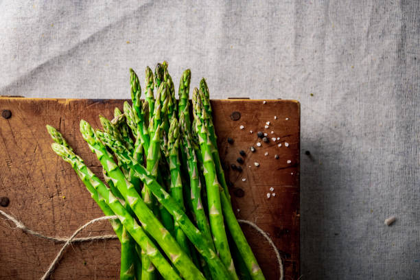istock Bunch of fresh green asparagus. 1405410659