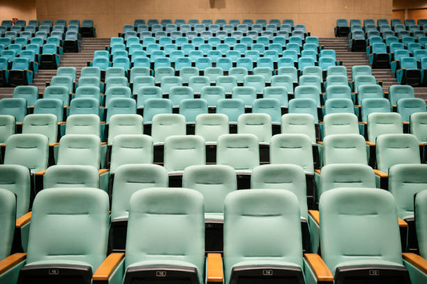 Red audience seats in the theater, opera, concert hall, cinema