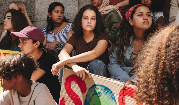 istock Diverse youth activists holding a climate change demonstration 1405418572
