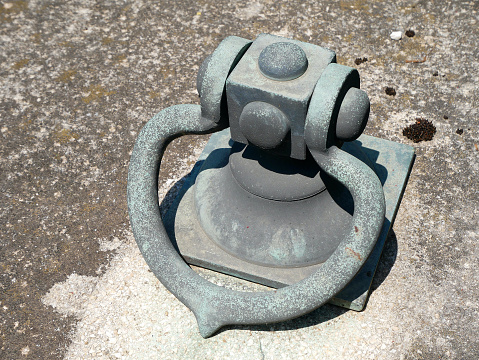 Handle of the tombstone in the public cemetery