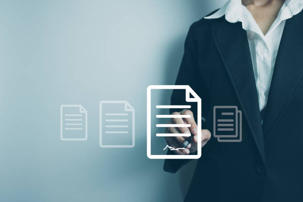 istock Businesswoman using a pen to sign electronic documents via the Internet, Work from home concept, remote work, new normal office, access to document with secret code or encode, identity verification 1405425221