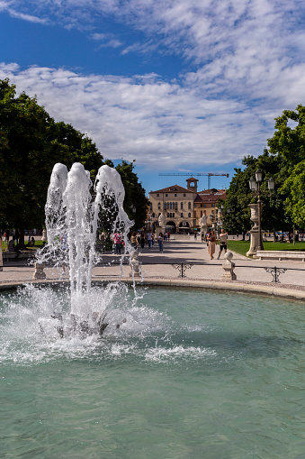 Padua, Italy - 06 10 2022: Fountain at the Prato della Valle square in Padua on a summer day.