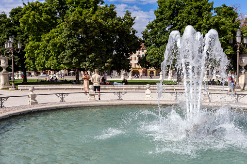 Padua, Italy - 06 10 2022: Fountain at the Prato della Valle square in Padua on a summer day.
