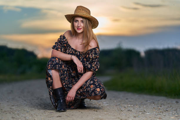 istock Pretty plus size farmer lady at sunset 1405433442