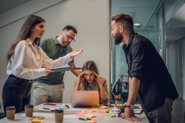 istock Stressed business colleagues having a meeting in an office and solving problems 1405434693