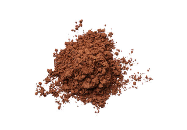 istock Heap of cocoa powder isolated on white background. 1405436744