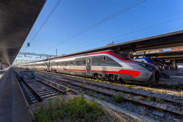 Le Frecce high-speed trains at Padua station on a summer day stock photo