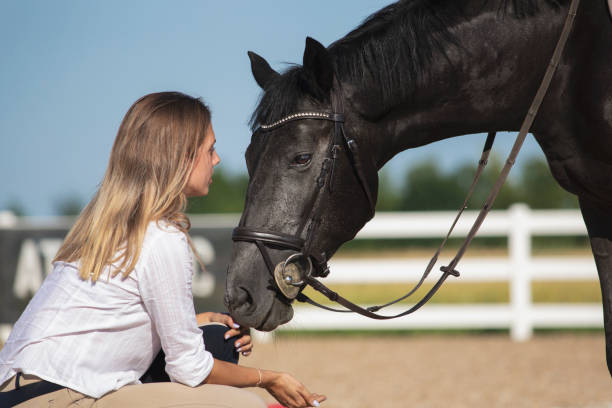 istock Woman and horse 1405440691