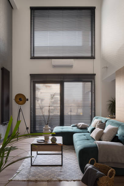 istock Big windows in lofty living room 1405441530