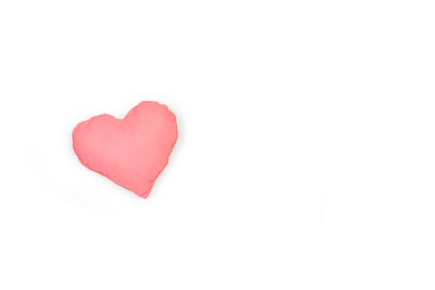 istock A fabric pink heart on a white background 1405444872