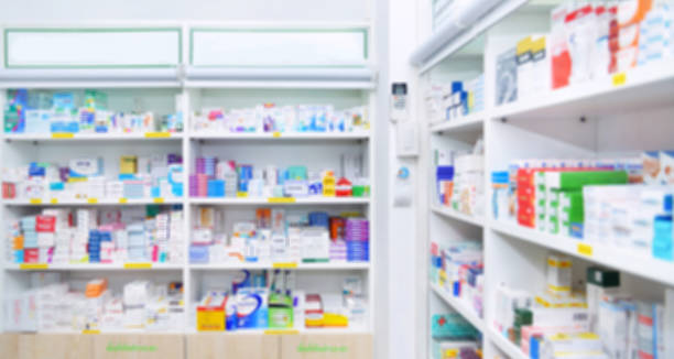 istock Medicine on shelves in Pharmacy interior with blurred background 1405445262