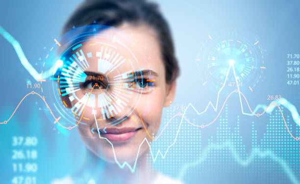 istock Businesswoman is watching at digital interface with financial graph, chart 1405449484