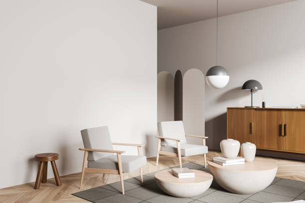 istock Light relax interior with armchair, coffee table, drawer and mockup wall 1405450985
