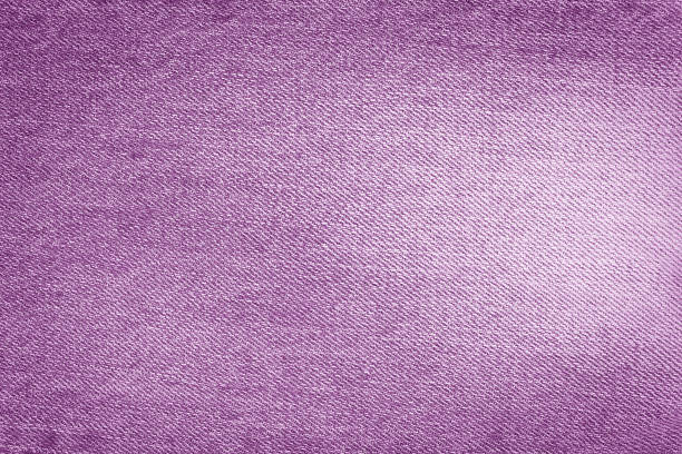 istock Jeans texture in purple color. Purple background 1405451131