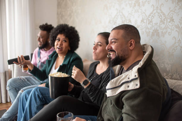 istock Friends watching movie at home 1405451711