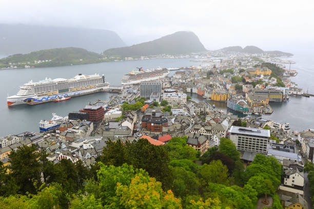Aalesund Norway 06/14/2022 Cruise liner Aida Prima in the Norwegian town Aalesund. Aerial view of Aalesund from the view point Aksla