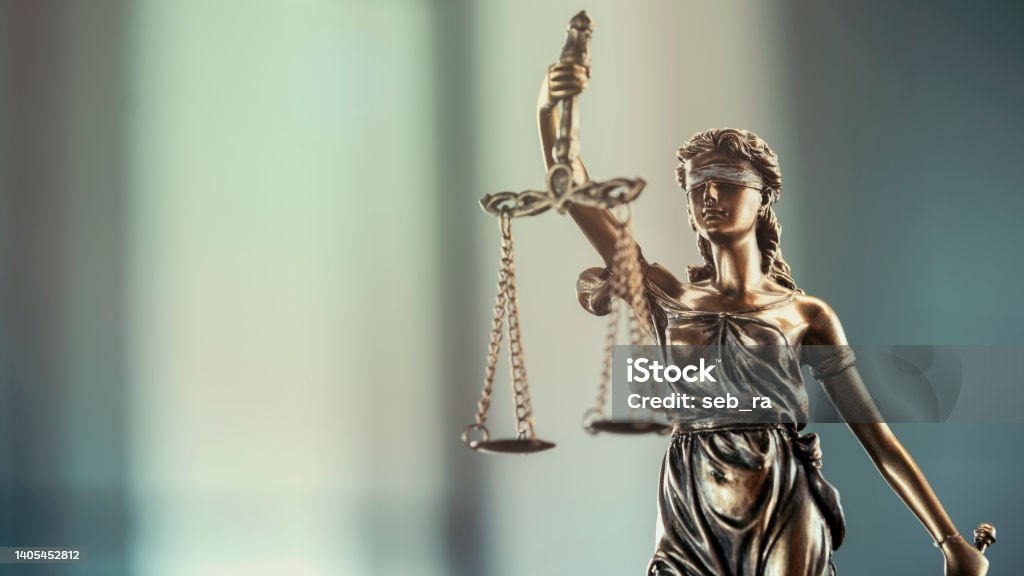Legal and law concept statue of Lady Justice on blurred background Lady Justice Stock Photo