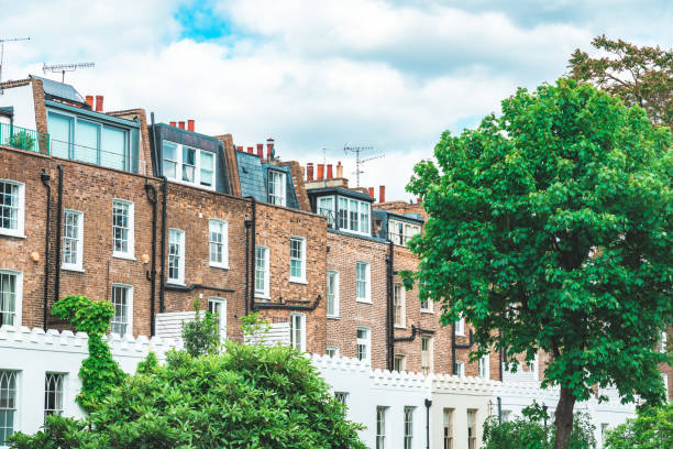 London architecture residential buildings along the canal London architecture residential buildings along the canal regents canal stock pictures, royalty-free photos & images