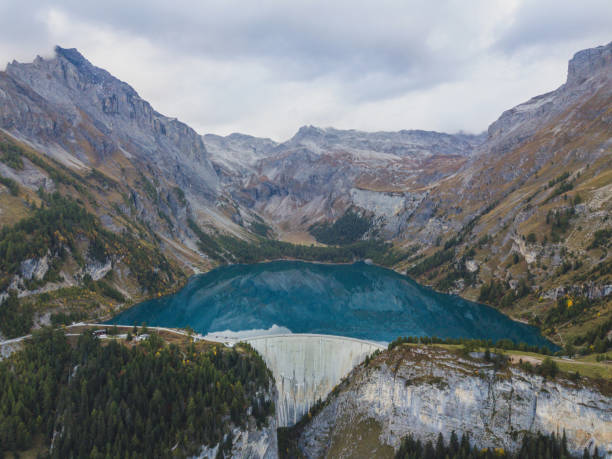 istock Water dam, generating hydro electricity power renewable energy 1405460715