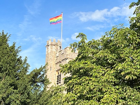 Celebrating Pride month with rainbow flag on the Church of St Peter & St Pauls in Bromley, Kent