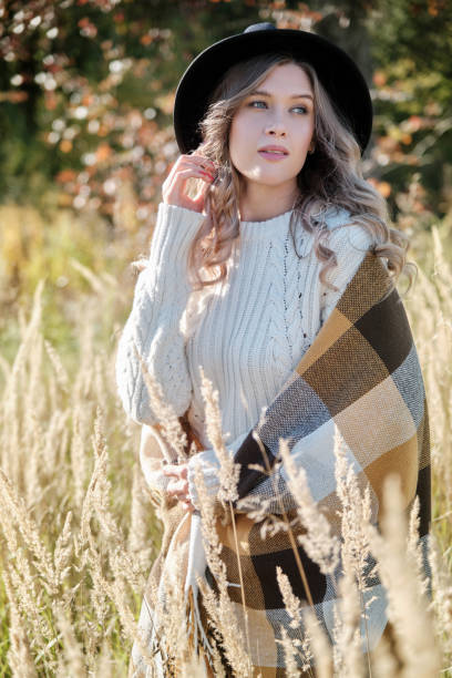 istock happy autumn woman 1405465249