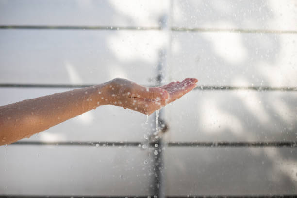 istock Woman having shower after swimming 1405467513