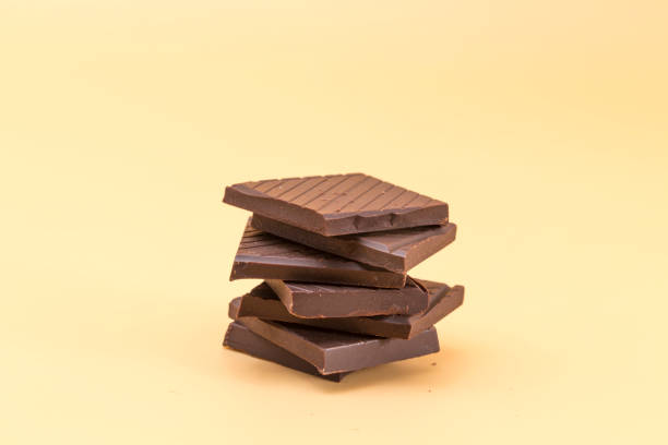 istock chocolate pieces on a cream background 1405470781