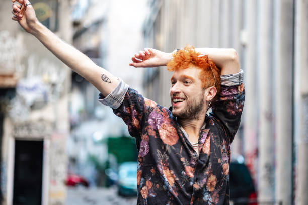 istock Cheerful eccentric young man on the street 1405470997