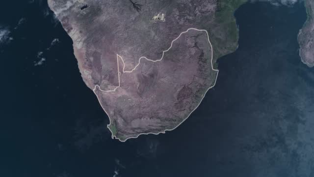 Highlighted South Africa map, zooming in from the space through a 4K photo real animated globe, with a panoramic view consisting of Africa, West Europe and USA. Epic spinning world animation, Realistic planet earth, highlight, satellite, aerial