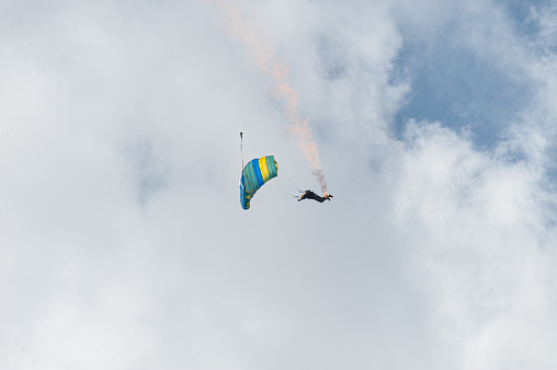 Gothenborg, Sweden - August 29 2009: Person performing a parachuting display with smoke.