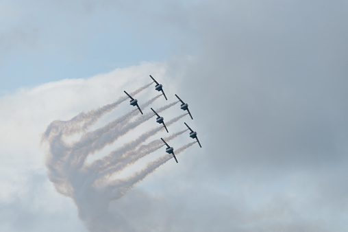 San Diego, California, USA - September 24, 2022: The Blue Angels ground crew on the flight line at sunrise for the 2022 Miramar Airshow.