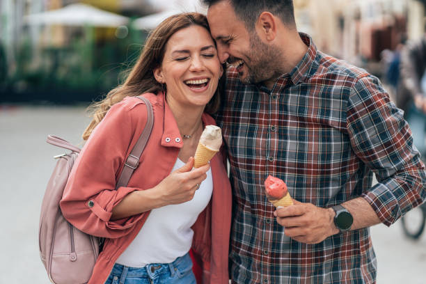 istock Happy couple eating ice cream 1405480125