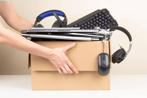 woman hands holding cardboard box full old used computers, phones, tablets, gadget devices for recycling. planned obsolescence, e-waste, donation, electronic waste for reuse and recycle concept - environmental damage audio imagens e fotografias de stock