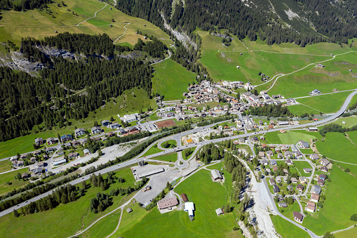 Aerial view of Splügen located on a ridge between the Splügen pass and San Bernardino pass, Swiss Alps, Switzerland.