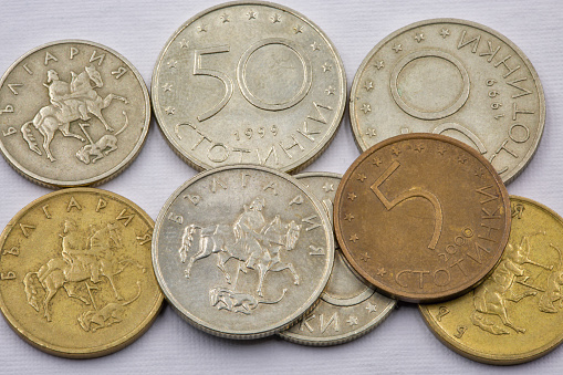 Used Bulgarian coins closeup against white