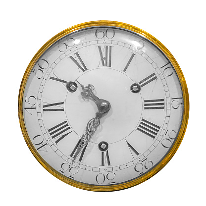 Brass compass on a wooden background