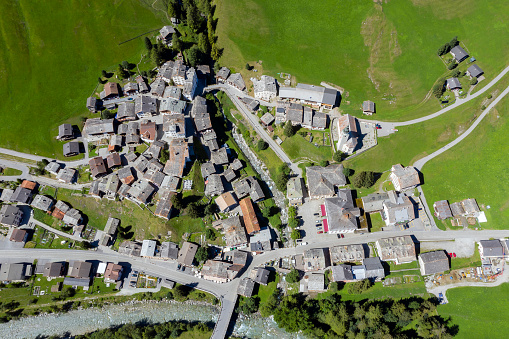 Aerial view of Splügen located on a ridge between the Splügen pass and San Bernardino pass, Swiss Alps, Switzerland.