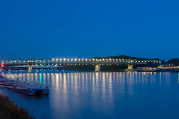 Bratislava, Slovakia - May 31, 2022: Stary most (English: Old Bridge) at night. Bridge over the river Danube in Bratislava.