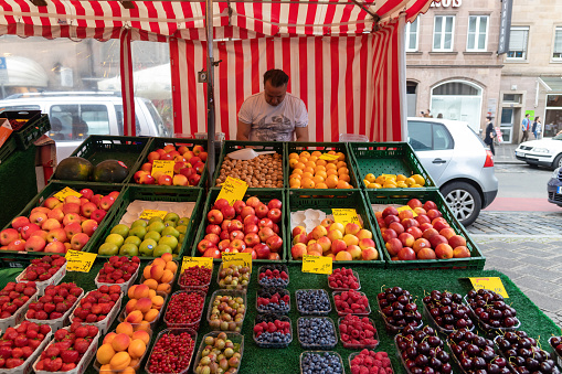 Greengrocer at public market