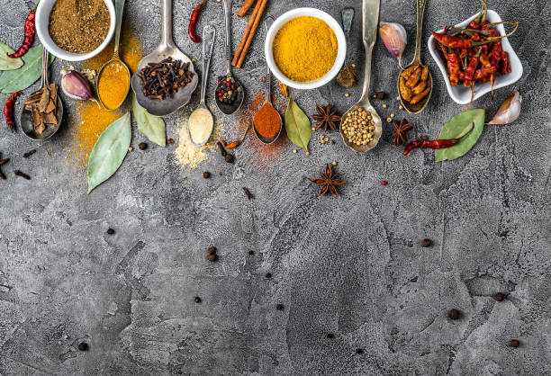 istock spices on white wooden background 1405492212