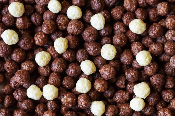 istock Mix of black and white corn balls. Breakfast background 1405492235