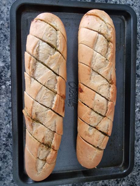 istock Oven cooked garlic bread baguettes 1405492963